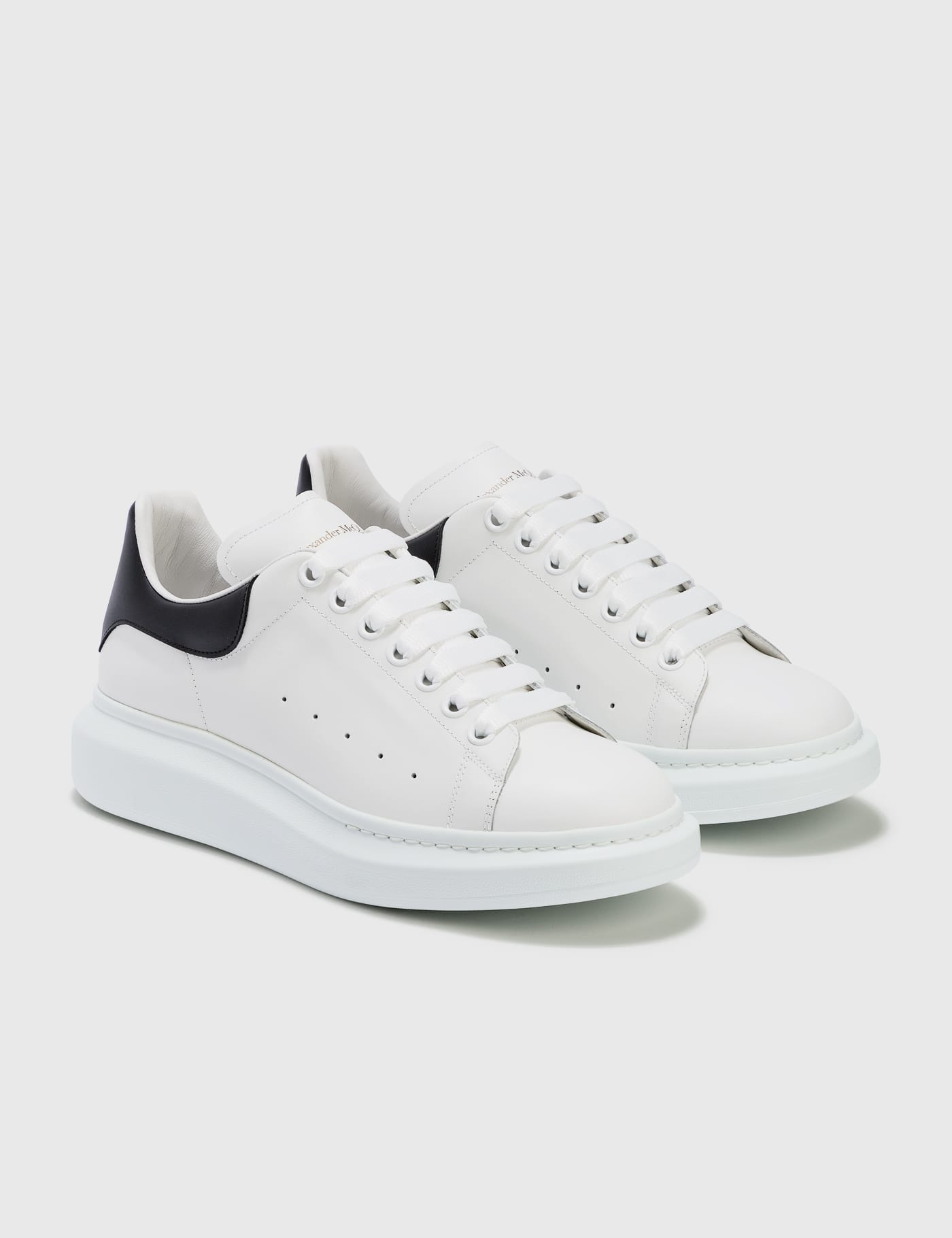 Alexander McQueen | Classic white and beige leather sneakers | Savannahs